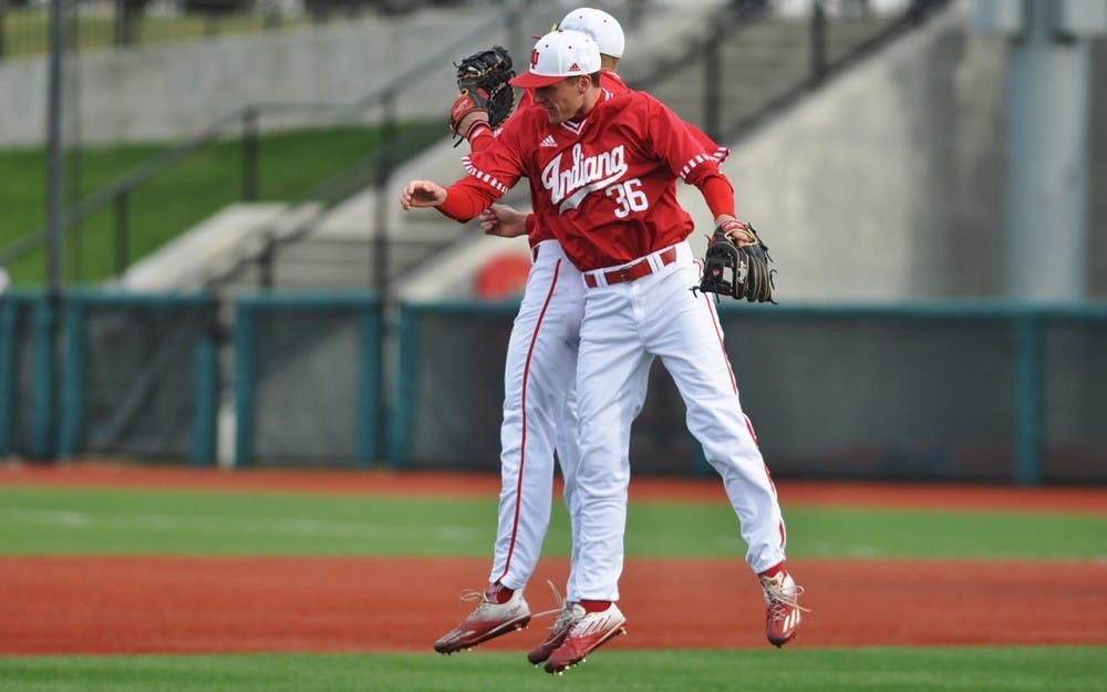 Junior Colby Stretten and freshman Matt Gorski celebrate the Hoosiers’ 12-1 victory over Middle Tennessee on Saturday at Bart Kaufman Field.