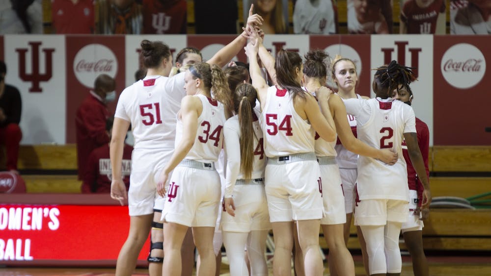The IU women&#x27;s basketball team huddles before a game against Purdue on March 6, 2021, at Simon Skjodt Assembly Hall. Indiana begins the 2021 season with an exhibition game against the University of Indianapolis on Nov. 5 at Simon Skjodt Assembly Hall.