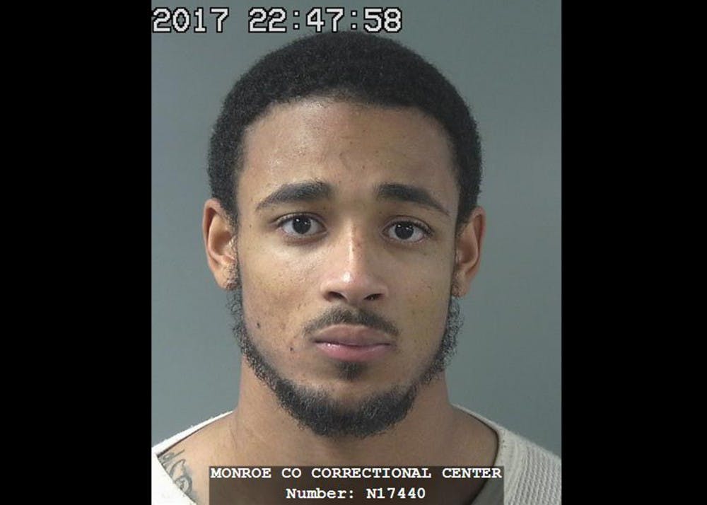 D'Angelo M. Roberts, 25, former running back for the IU football team, is currently being held at the Monroe County Jail on preliminary felony charges of burglary with a deadly weapon, armed robbery and theft. Roberts, a graduate of Bloomington North High School, is being held on a $30,000 surety bond and a $2,000 cash bond.