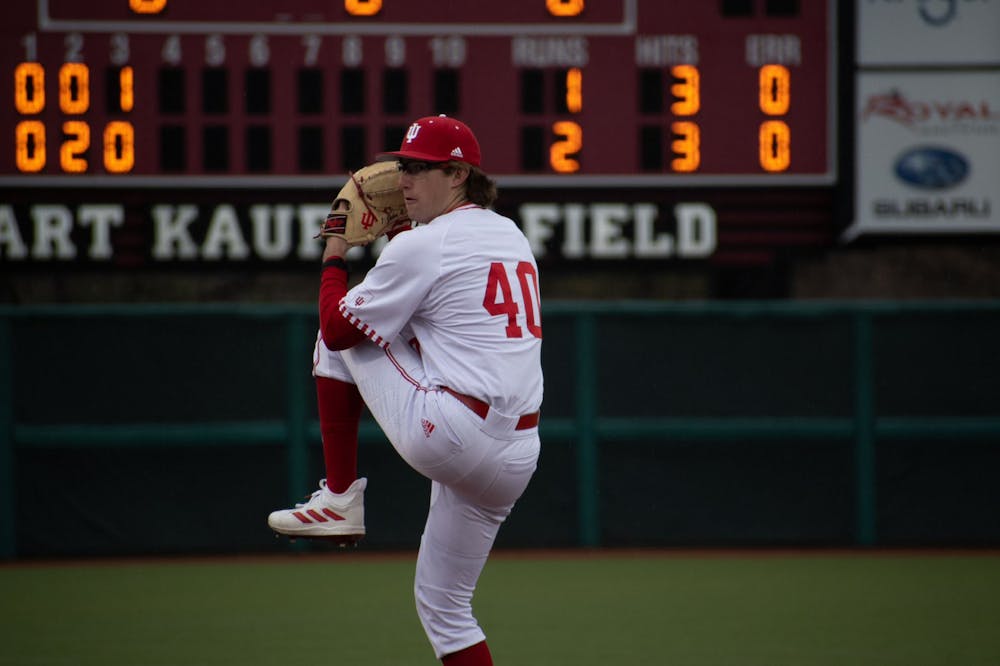 <p>Freshman right-handed pitcher Ethan Phillips ﻿prepares to pitch the ball March 21, 2023, at Bart Kaufman Field in Bloomington. Phillips and freshman Tyler Cerny earned Big Ten weekly awards on Monday.</p>