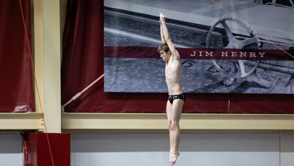 Freshman Carson Tyler is seen diving at the Counsilman-Billingsley Aquatic Center on Jan. 28, 2022. Indiana will send three divers to Atlanta, Georgia, for the 2022 NCAA Men&#x27;s Swimming and Diving Championships on March 23-26.