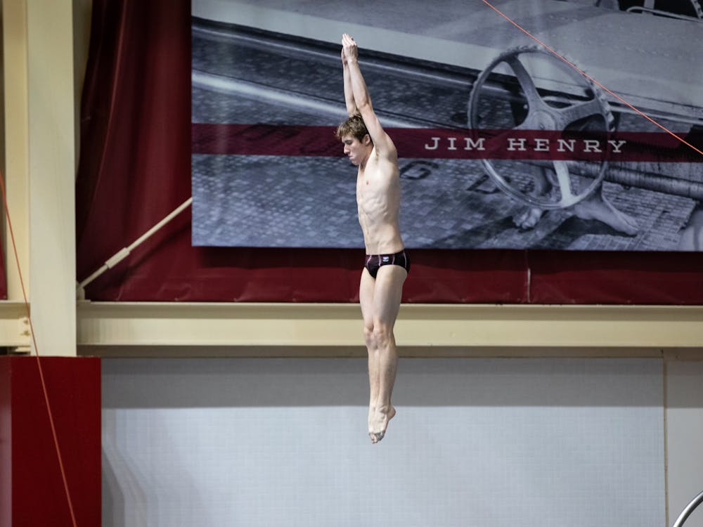 Freshman Carson Tyler is seen diving at the Counsilman-Billingsley Aquatic Center on Jan. 28, 2022. Indiana will send three divers to Atlanta, Georgia, for the 2022 NCAA Men&#x27;s Swimming and Diving Championships on March 23-26.