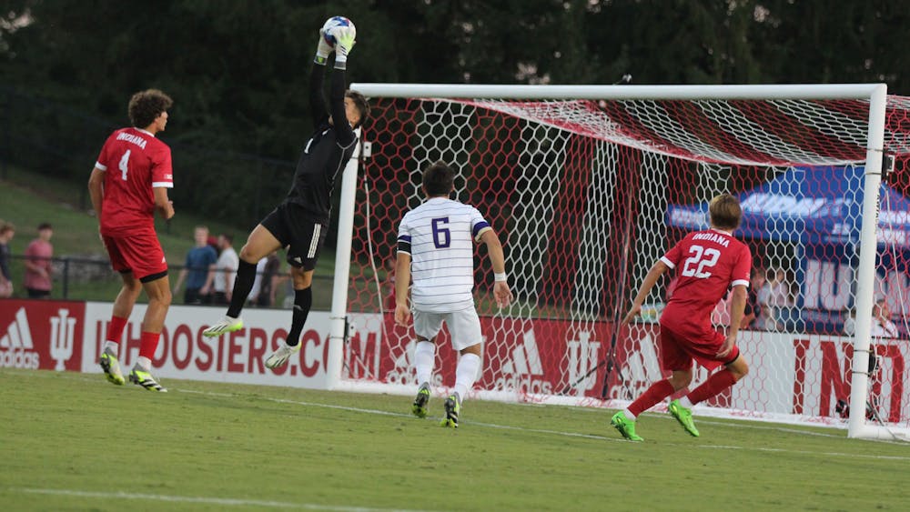 Senior goalkeeper JT Harms leaps up to save a shot against the University of Washington September 1, 2023, at Bill Armstrong Stadium. Harms had seven saves against the University of South Florida on Friday night.