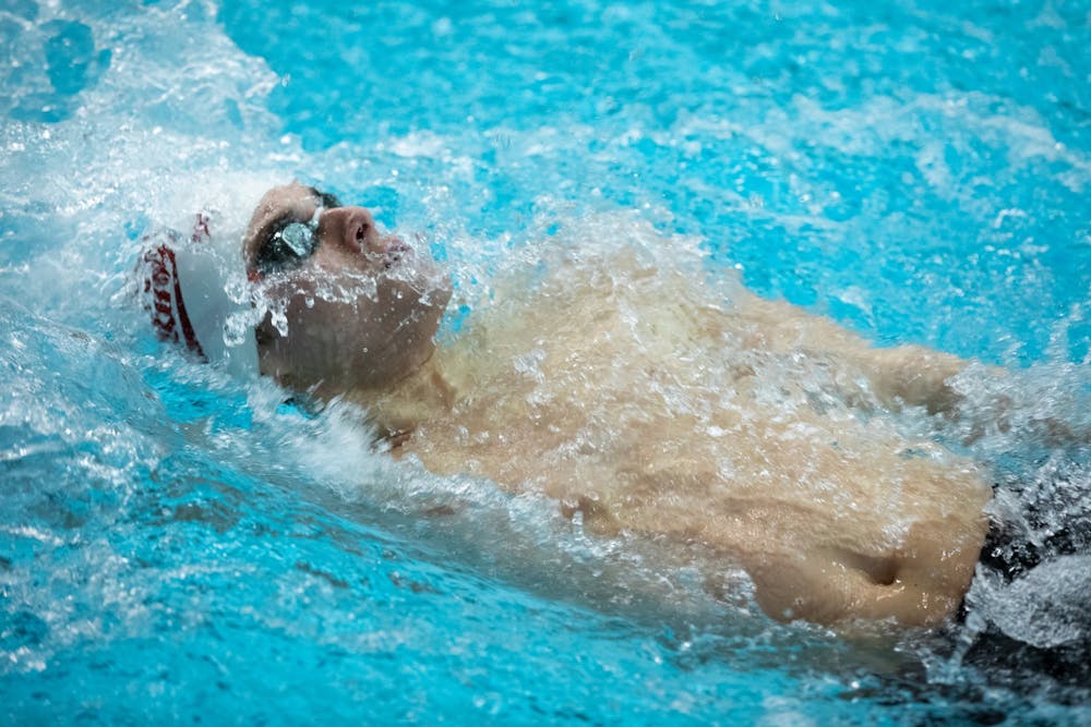 <p>﻿Then-sophomore Logan Graham swims in the men&#x27;s 100-yard backstroke race on Jan. 28, 2022, at the Counsilman Billingsley Aquatic Center. Indiana will travel to Ohio State for its next meet Nov. 17.<br/></p>
