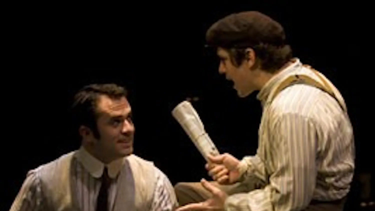 Actors Corey Greenan (left) and Matt Brown rehearse a scene from “The Sixth Borough” during a dress rehearsal Tuesday evening. The musical opens at 7:30 p.m. tonight at the Wells-Metz Theatre and will run through Sunday.