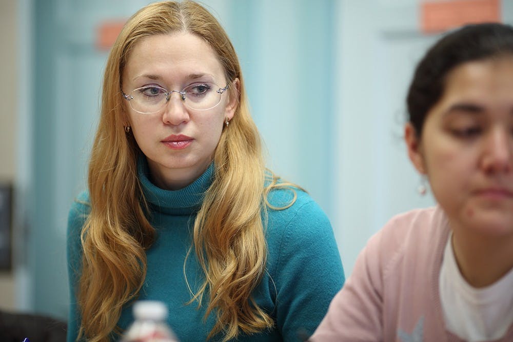 Olga Us of Vladivostok State University of Economics and Service listens during a session on international strategic planning at IU's East Asian Studies Center.