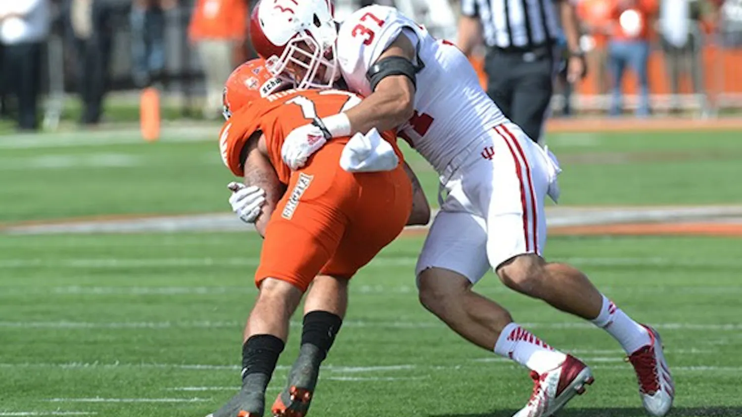 Senior Mark Murphy makes a tackle during IU's game against Bowling Green on Saturday at Doyt Perry Stadium.