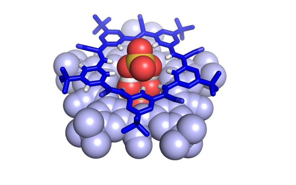 The bisulfate dimer as seen from the top down (upper image) and side (lower image). The two negatively charged molecules are connected by weak bonds made possible through encapsulation inside a pair of a star-shaped cyanostar macrocycles (blue), a molecule previously developed by Flood’s lab at IU. 