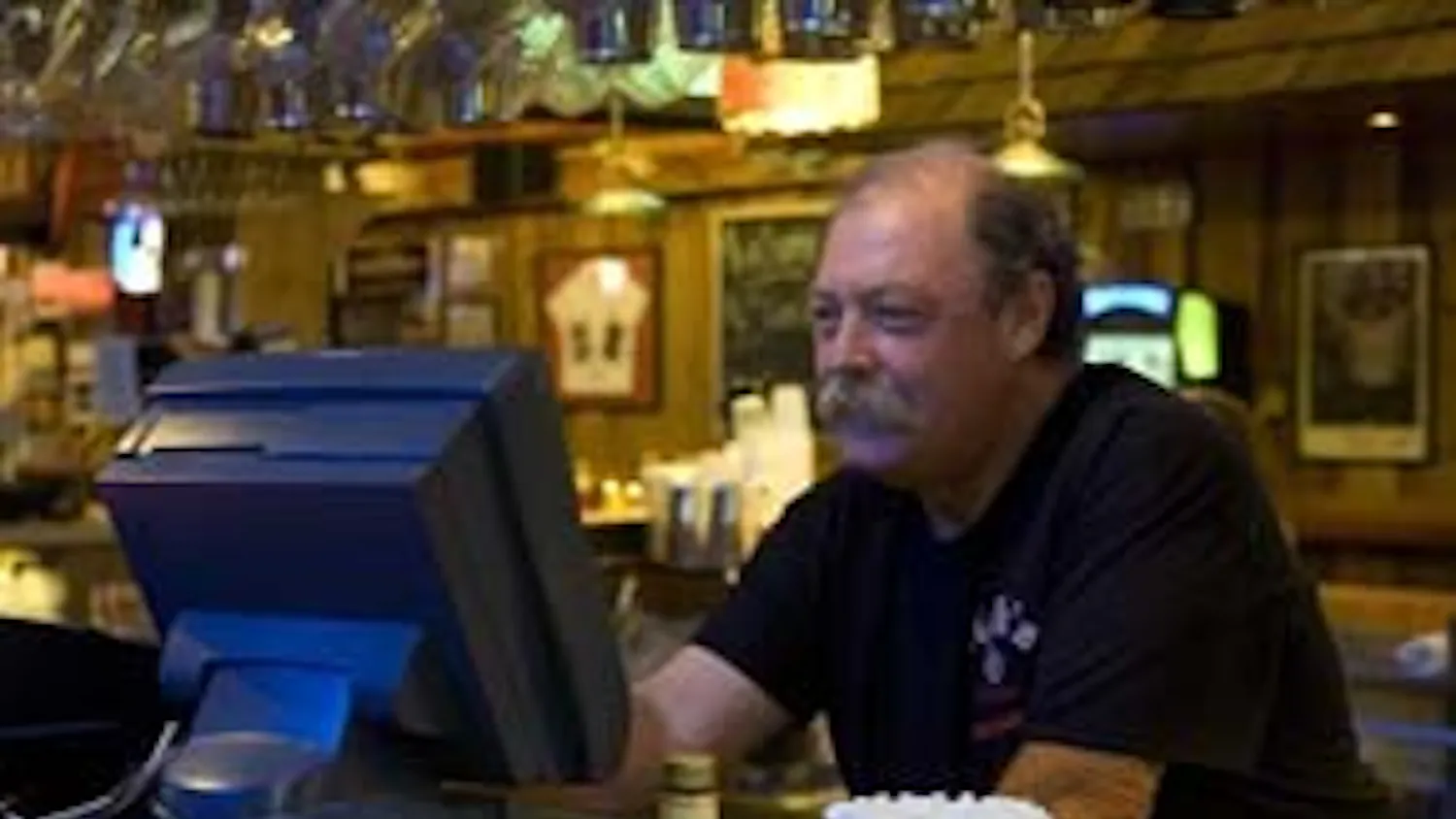 Bob "Hebe" Hebenstreit tends bar at Nick's English Hut on Aug. 20.