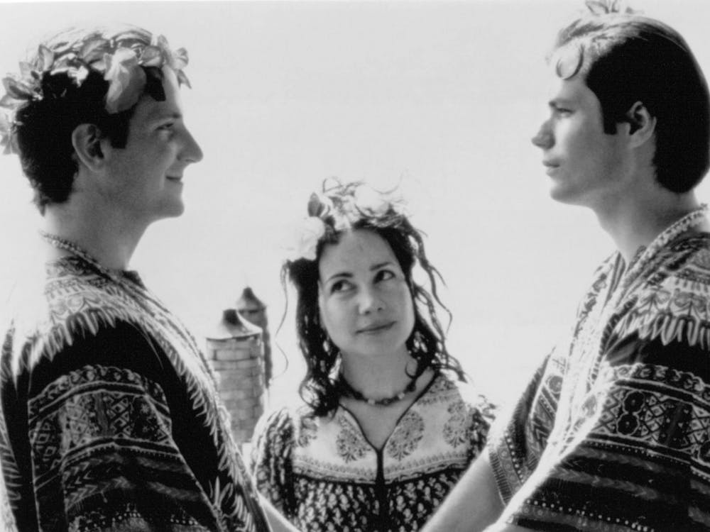 Bradley Cooper (left), Janeane Garofolo (center)and Michael Ian Black (right) are photographed on set of &quot;Wet Hot American Summer&quot; (2001). Set in 1981 at the fictional Camp Firewood, the main story follows a group of counselors as they navigate love and relationships on the last day of camp.