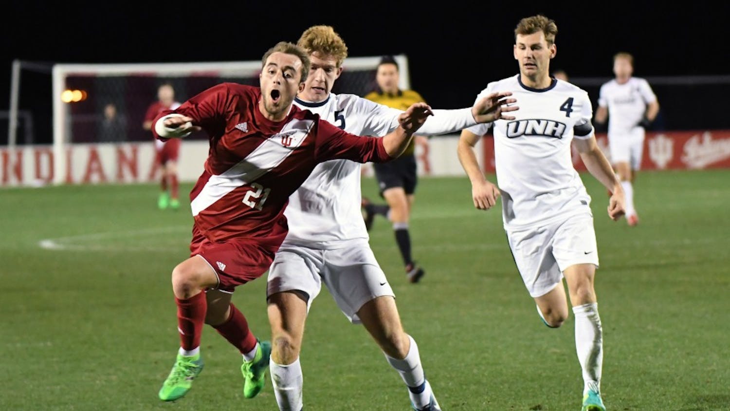 Redshirt freshman defender Spencer Glass is fouled by New Hampshire in the third round of the NCAA tournament Saturday evening at Bill Armstrong Stadium. Junior midfielder Francesco Moore made a penalty kick after the foul to score IU's second goal in their 2-1 win against New Hampshire.
