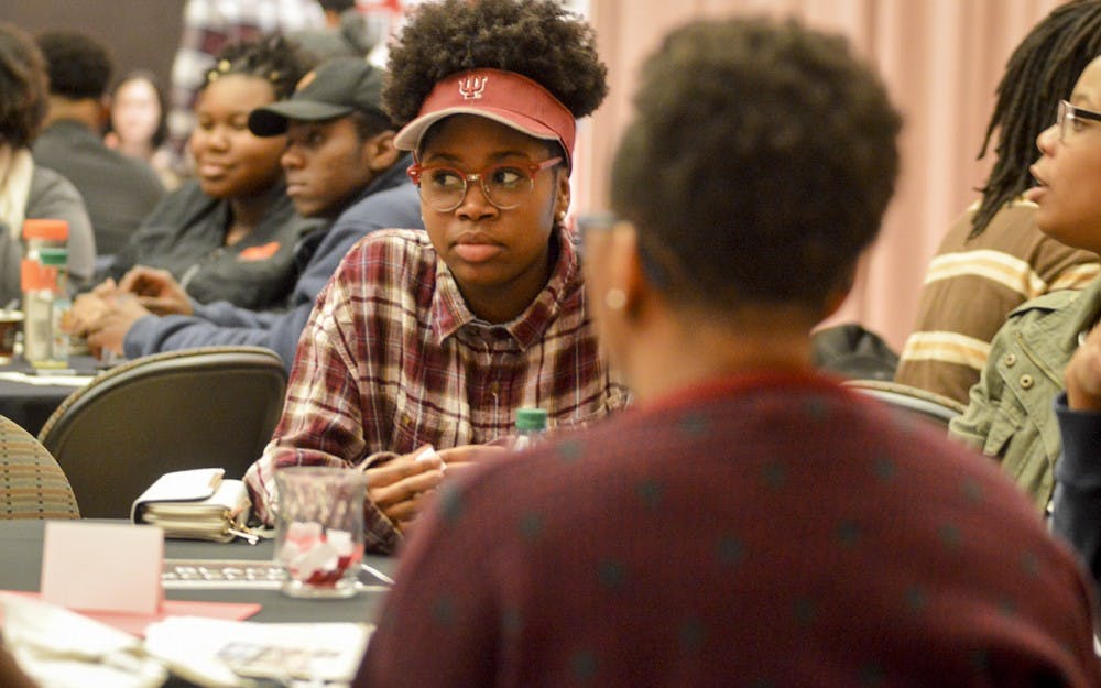 IU students play fishbowl games of fact or myth during the “Black Love, Sex, and Everything Else” event Wednesday evening in the Neal Marshall Black Culture Center. Students enjoyed open dialogue, games of facts and fiction about sex, and discussions on relationship and gender norm stereotypes.