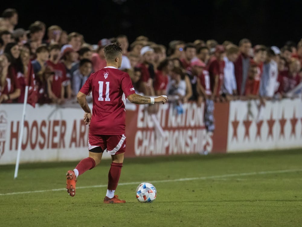 Senior Nyk Sessock dribbles the ball on September 3rd, 2021, at Bill Armstrong Stadium. Indiana men&#x27;s soccer will face Saint Louis University in the second round of the NCAA Tournament on Sunday.