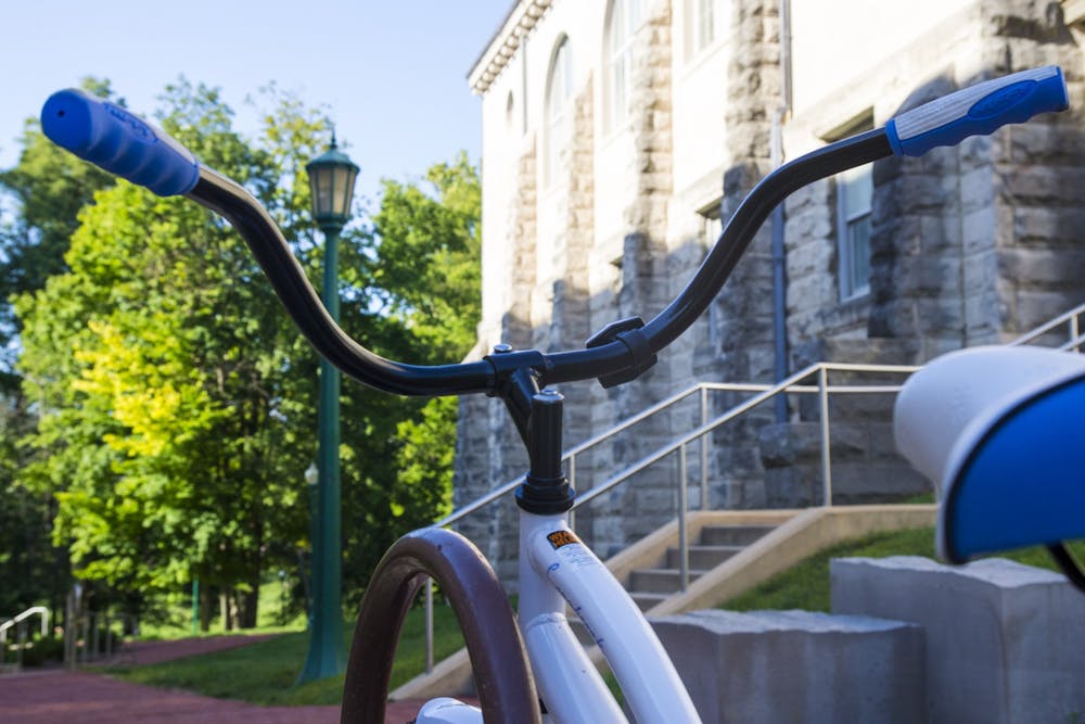 <p>A bike is locked to a rack Sept. 3, 2019, outside Franklin Hall. Multiple cyclists were injured in a crash March 4, 2023, during the Candy Stripe Classic, a bike race for collegiate teams.</p>