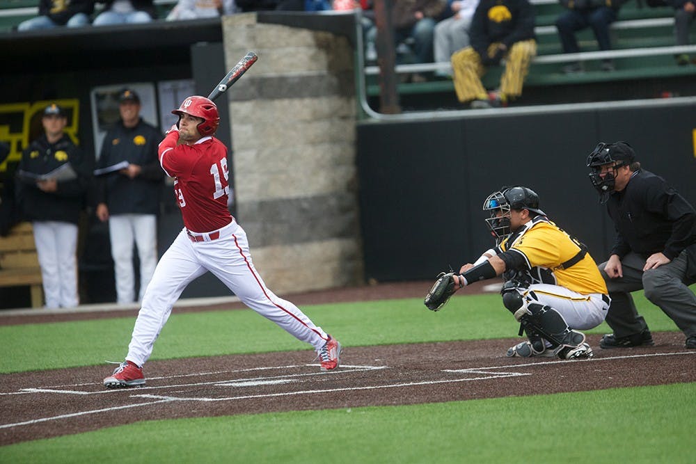 Indiana outfielder Ricky Alfonson hits the ball during game three of the series at Banks Field on Sunday, March 29, 2015. IU was swept by Iowa. 