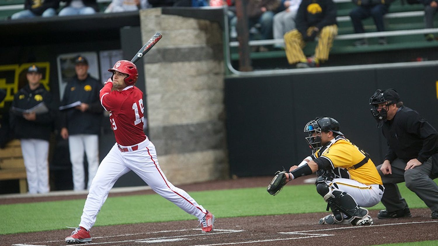Indiana outfielder Ricky Alfonson hits the ball during game three of the series at Banks Field on Sunday, March 29, 2015. IU was swept by Iowa. 