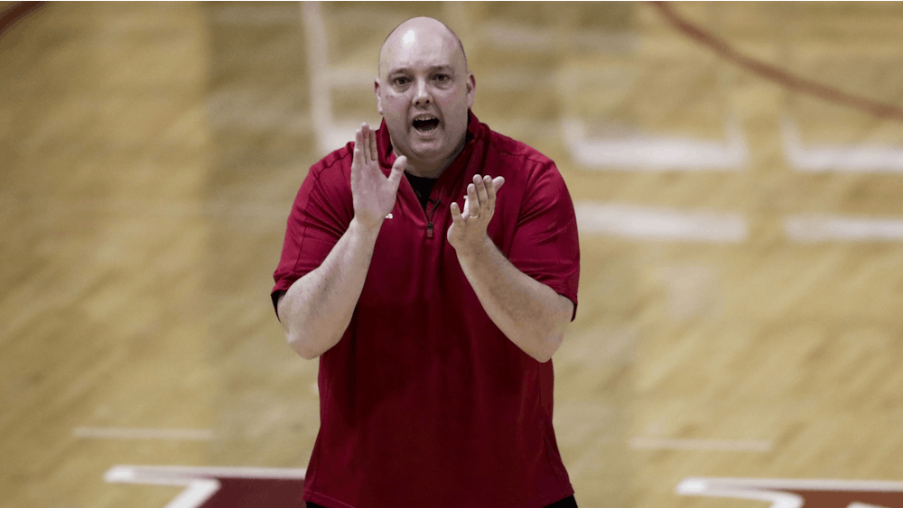 IU volleyball Coach Steve Aird encourages his team during fall camp in August 2018. Aird said new volunteer assistant Gwen Egbert is &quot;an impressive person with a contagious energy.&quot;