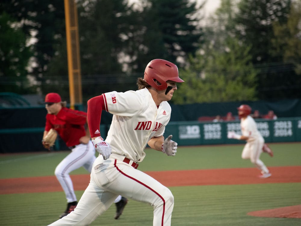 Sophomore firstbaseman Brock Tibbitts runs to first April 18, 2023 against Louisville at Bart Kaufman Field in Bloomington. Indiana hosts Purdue this weekend in the team&#x27;s final home series. 