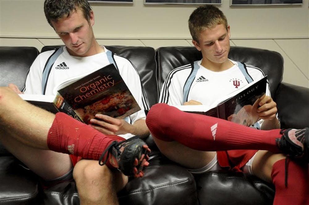 Redshirt sophomore Tyler McCarroll and freshman Matt Wiet read literature from courses required for a pre-med degree. McCarroll and Wiet, along with senior Ofori Sarkodie are all majoring in pre-med. But will they choose medicine or the MLS?