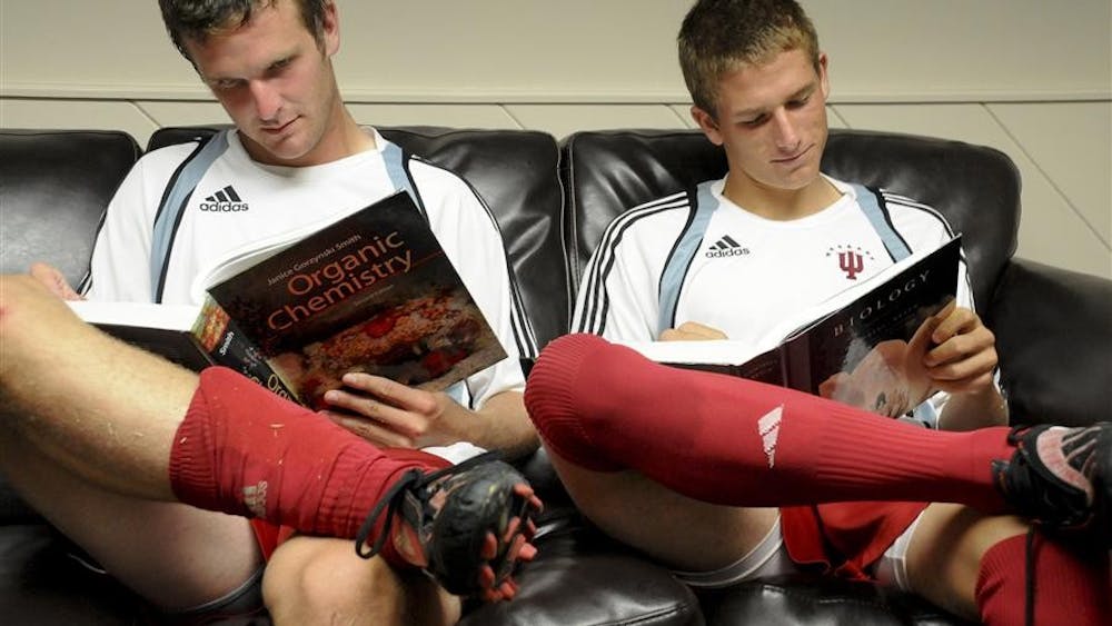Redshirt sophomore Tyler McCarroll and freshman Matt Wiet read literature from courses required for a pre-med degree. McCarroll and Wiet, along with senior Ofori Sarkodie are all majoring in pre-med. But will they choose medicine or the MLS?