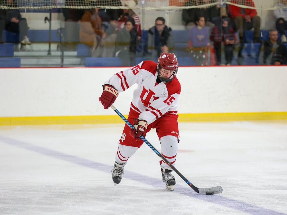 Then-junior forward Carter Bonecutter controls the puck during the Indiana&#x27;s club hockey team game against the University of Kentucky on Nov. 20, 2021, at Frank Southern Ice Arena in Bloomington. The Hoosiers won both matches against Bowling Green State University on Oct. 14-15, 2022.