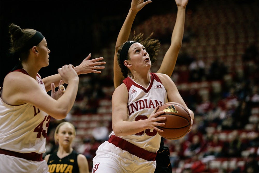 Sophomore forward Amanda Cahill jumps towards the basket in an attempt to score. Cahill led in scoring against the Hawkeyes, putting up 24 points to help the Hoosiers win 79-74 on Thursday night at Assembly Hall.