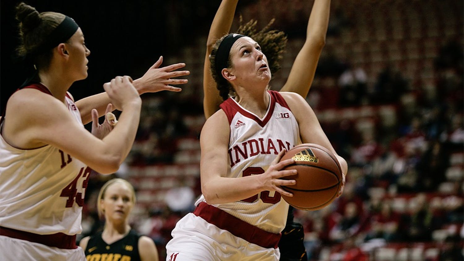 Sophomore forward Amanda Cahill jumps towards the basket in an attempt to score. Cahill led in scoring against the Hawkeyes, putting up 24 points to help the Hoosiers win 79-74 on Thursday night at Assembly Hall.