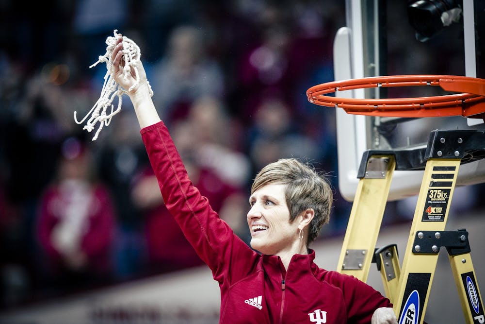<p>Head coach Teri Moren celebrates after cutting the net Feb. 19, 2023, at Simon Skjodt Assembly Hall in Bloomington. Moren was named an assistant for USA Basketball on Tuesday.</p>