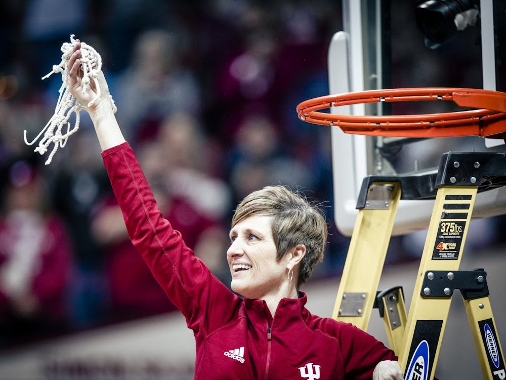 Head coach Teri Moren celebrates after cutting the net Feb. 19, 2023, at Simon Skjodt Assembly Hall in Bloomington. Moren was named an assistant for USA Basketball on Tuesday.