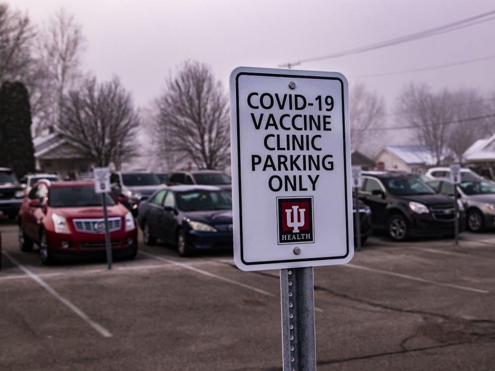 A sign is posted at the COVID-19 vaccination site in the Employee Health Services building. Students will be able to sign up for vaccination appointments at Simon Skojdt Assembly Hall for the week of April 19 to 23 at the earliest, even though students will be eligible to register on Wednesday. 