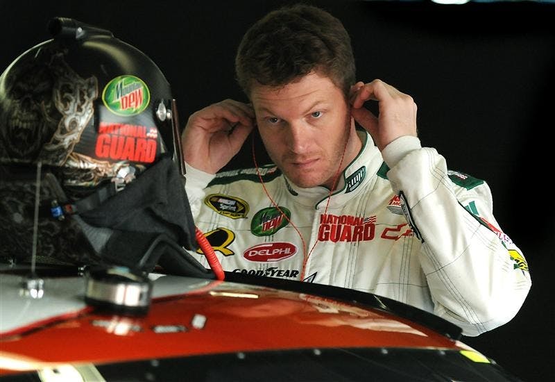 NASCAR driver Dale Earnhardt Jr. prepares to climb into his car to begin practice for the Dollar General 300 NASCAR Nationwide Series race on Oct. 10 at Lowe's Motor Speedway in Concord, North Carolina.