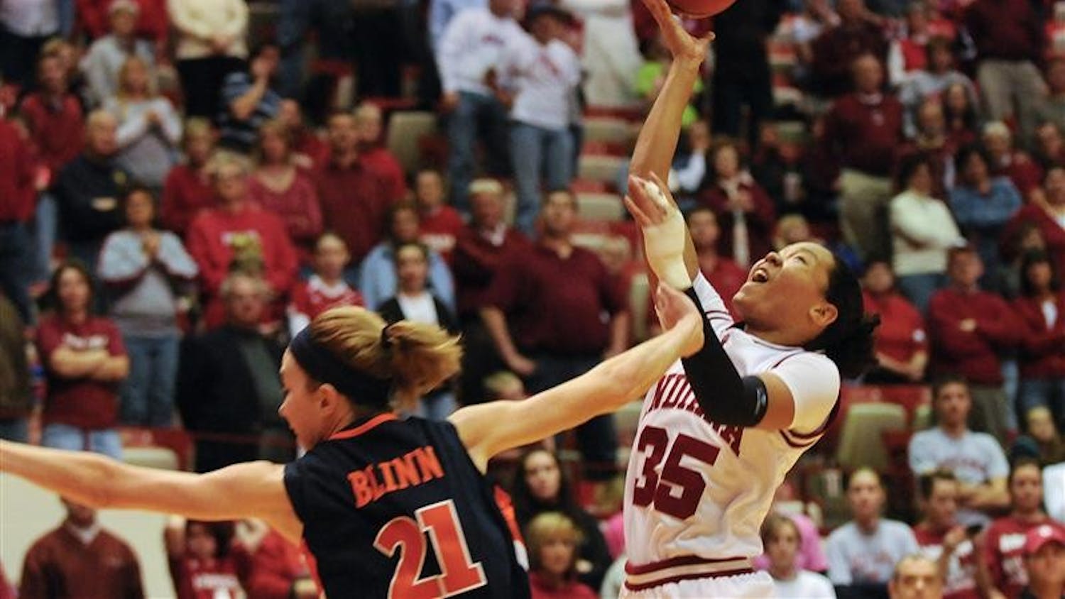 Illinois guard Macie Blinn fouls IU guard Kim Roberson during the second half of IU's 66-59 loss Feb. 8 at Assembly Hall. Roberson had 11 points and nine rebounds.