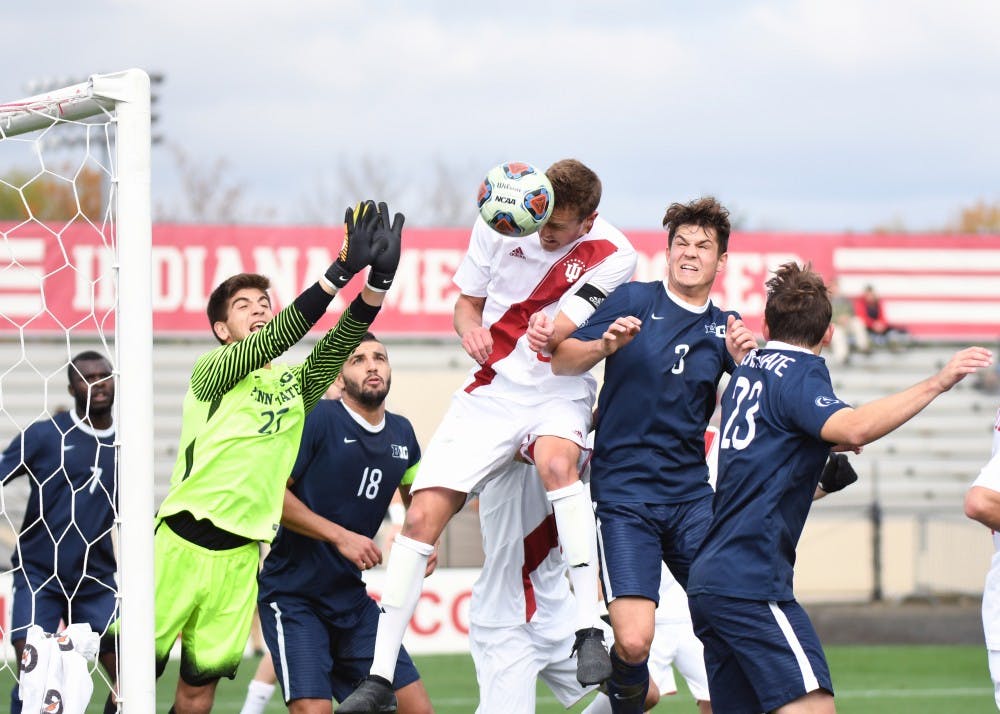 Senior defender Grant Lillard heads a ball off of a corner kick against Penn State on Monday afternoon at Bill Armstrong Stadium. Lillard had five shots in IU's 1-0 overtime win against Penn State in the first round of the Big Ten Tournament.