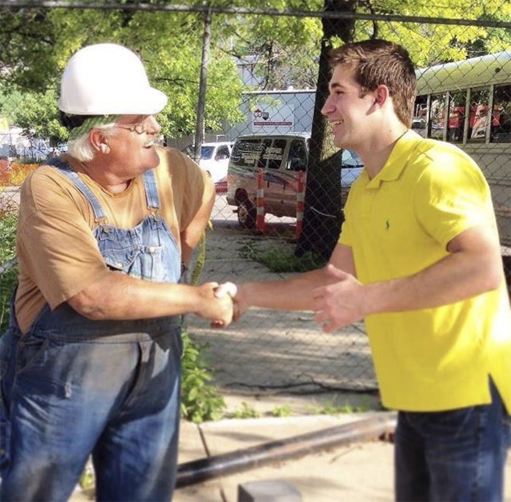 IU student Drew Ash (right) is running against State Rep. Matt Pierce for an Indiana House District 61 seat as an independent this year.