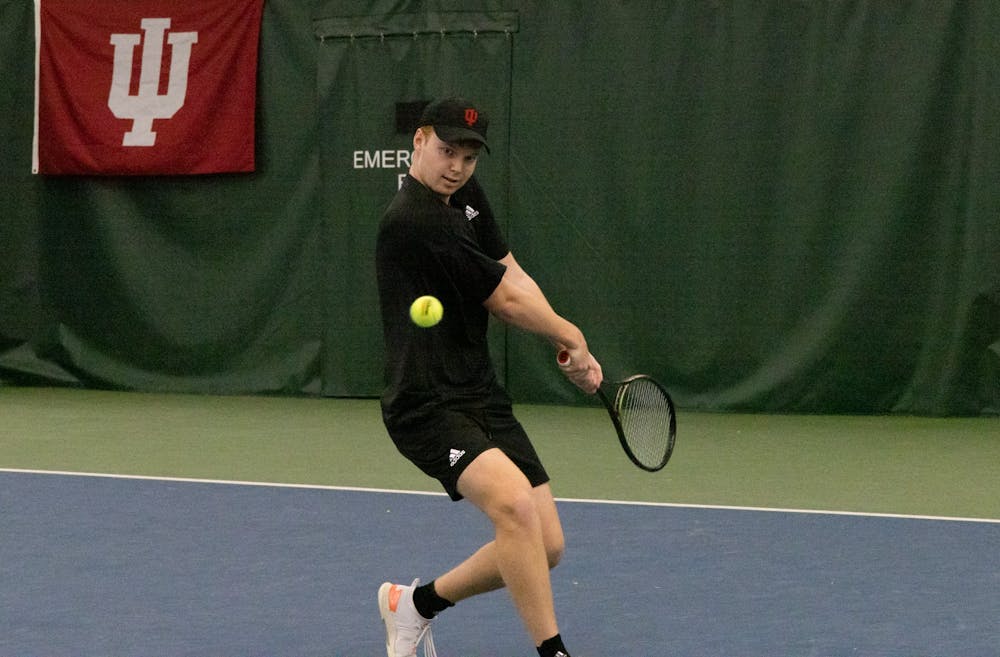 <p>Indiana University Junior Ilya Tiraspolsky sets up for a backhand winner against Southern Indiana on Feb. 12, 2023, at the IU Tennis Center. Indiana fell 4-3 to UCSB.</p>