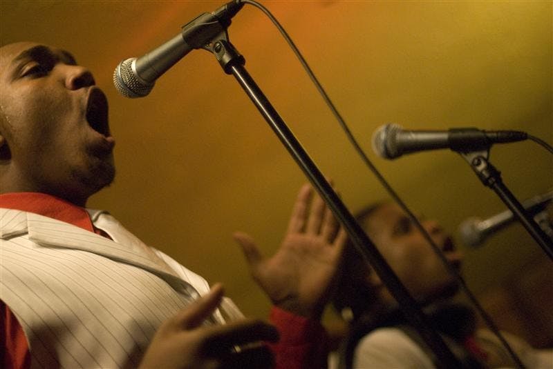 IU Soul Revue member and junior Troy Thomas performs with the group Wednesday night at Bear's Place. The well-acclaimed ensemble plays a variety of funk, soul and R&B classics as well as contemporary urban black popular music and original compositions.