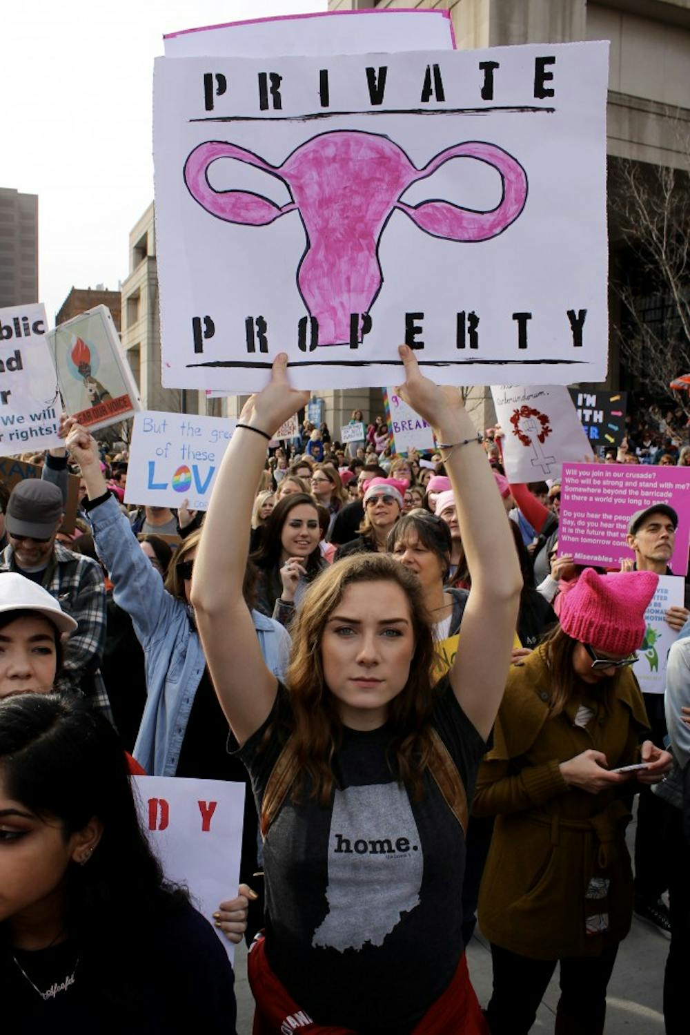 Moira Kehoe, an IU freshman, holds a sign during the Women's March on Jan. 20, 2017, in Indianapolis. There will be an anniversary march focused on voter registration Jan. 20 at the American Legion Mall in Indianapolis.&nbsp;