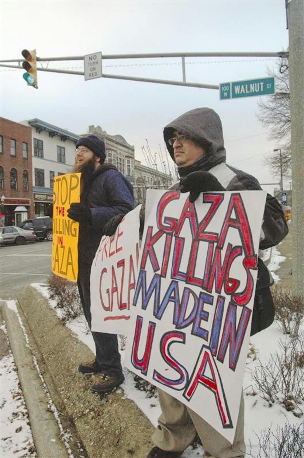 James Cooper (left) and Edward  Vasquez (right), two organizers for a demonstration on the conflict in Gaza, stood at the courthouse.
