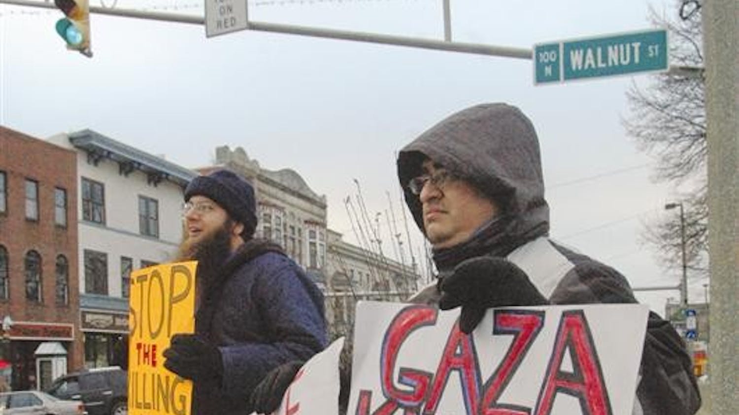 James Cooper (left) and Edward  Vasquez (right), two organizers for a demonstration on the conflict in Gaza, stood at the courthouse.