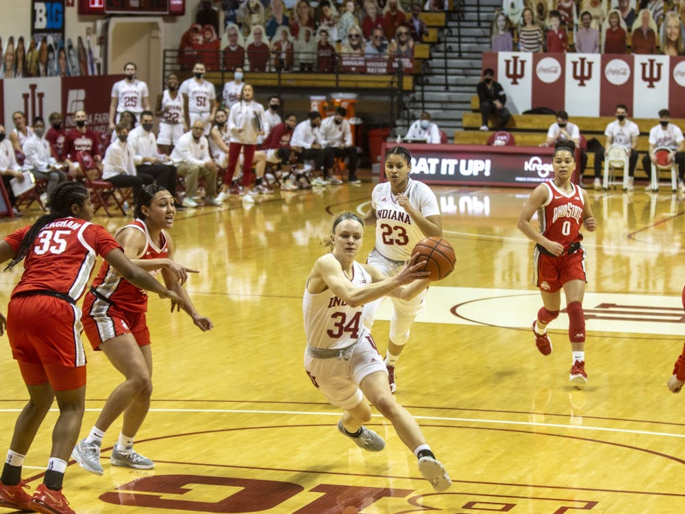 Junior guard Grace Berger drives to the basket Jan. 28 in Simon Skjodt Assembly Hall. IU women&#x27;s basketbal earned a bid to the NCAA Tournament on Monday as a No. 4 seed, the highest seed in program history.