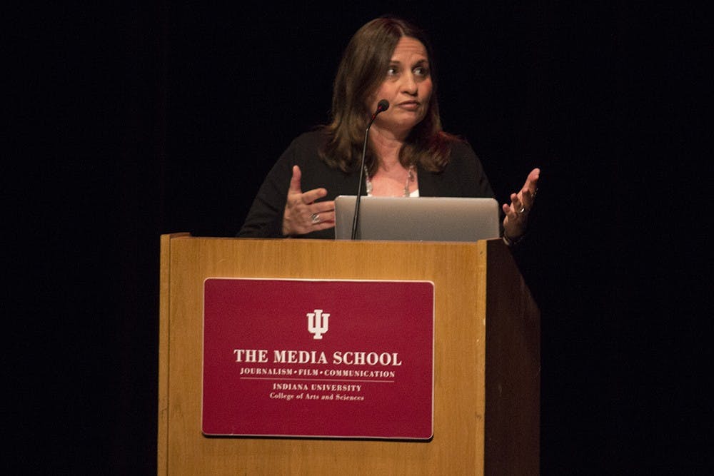 Soraya Sarhaddi Nelson speaks about her experience covering the Paris bombings during a lecture titled "War, Migration and Terror: The Globalization of Regional Conflict" on Thursday at Buskirk-Chumley Theater. The lecture was put on as a part of the Media School speaker series.
