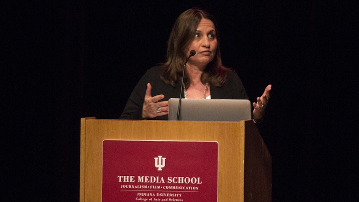 Soraya Sarhaddi Nelson speaks about her experience covering the Paris bombings during a lecture titled "War, Migration and Terror: The Globalization of Regional Conflict" on Thursday at Buskirk-Chumley Theater. The lecture was put on as a part of the Media School speaker series.