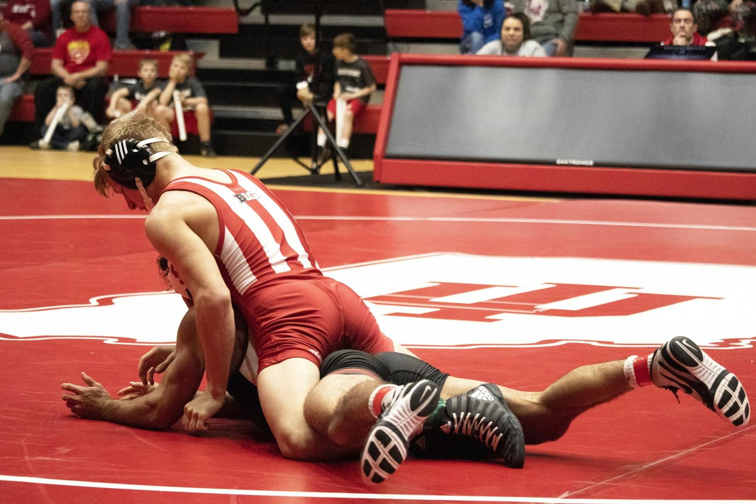 Then-freshman, now-sophomore Kyle Luigs wrestles Feb. 9 in Wilkinson Hall. IU wrestled in the Michigan State Open on Nov. 2 in East Lansing, Michigan. 