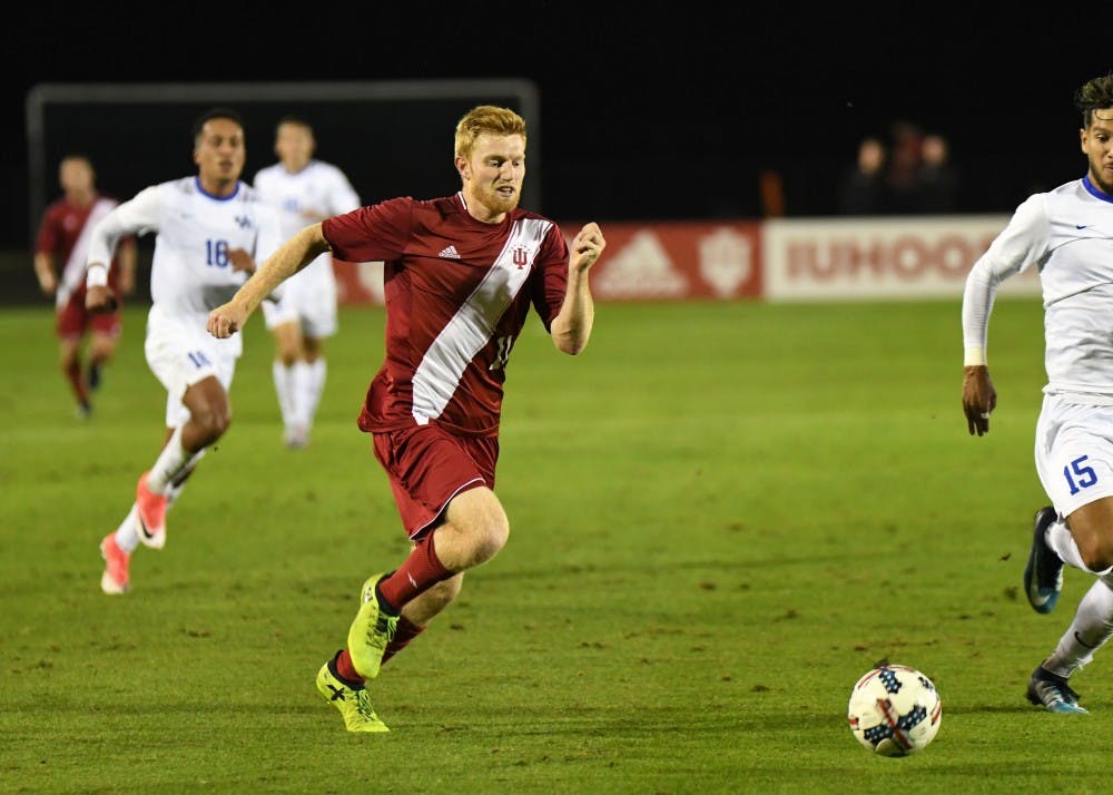 Junior midfielder Cory Thomas dribbles the ball against Kentucky on Oct. 11 at Bill Armstrong Stadium. Thomas scored the winning goal Monday afternoon against Penn State in a Big Ten Tournament Quarterfinal match.