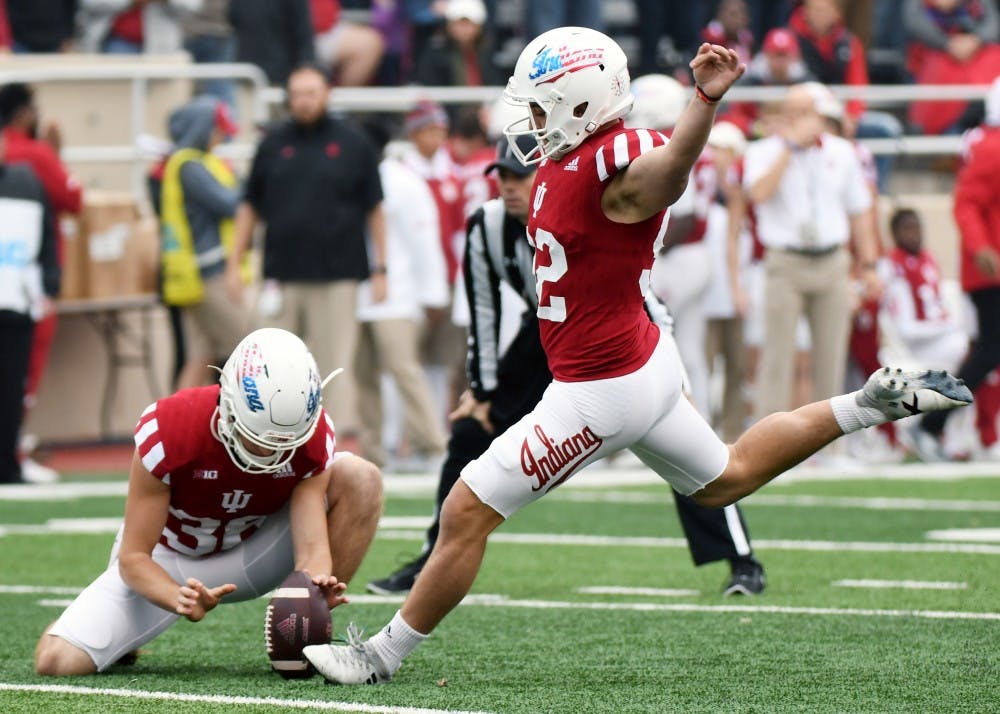 Former IU kicker Griffin Oakes kicks an extra point during the first half against Wisconsin on Nov. 4 at Memorial Stadium.