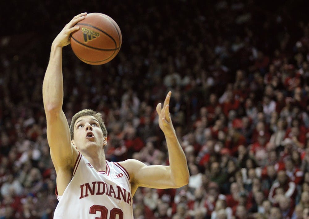 Sophomore forward Collin Hartman goes for a layup during IU's game against Purdue on Thursday at Assembly Hall.