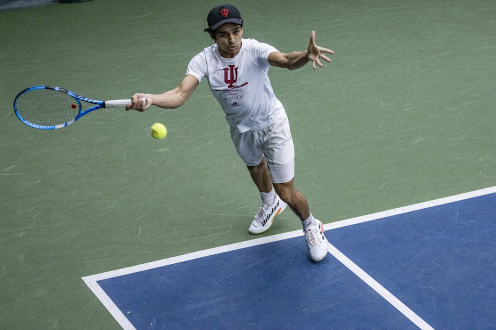 <p>Senior Vikash Singh attempts to return a serve against Princeton University in a doubles match on Feb. 6, 2022, at the IU Tennis Center. Indiana is 0-2 on the road this season after losing 7-0 to Auburn University on Monday in Auburn, Alabama.</p>