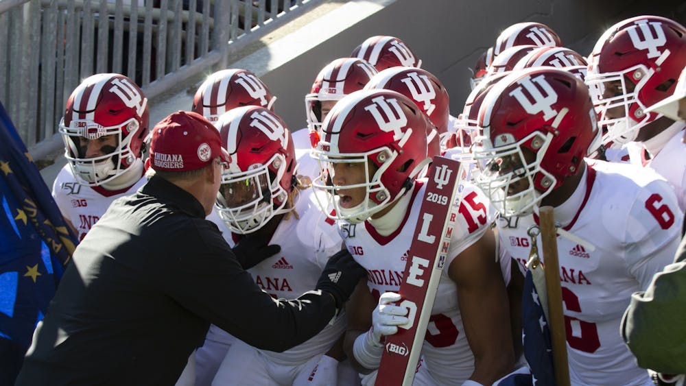 IU football head coach Tom Allen pumps his players up before a game Nov. 16, 2019, at Beaver Stadium in State College, Pennsylvania. The team&#x27;s first game this season will be Sept. 2 against Illinois.