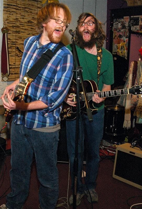 Neal Warner and Mike Bushman of The Alarmists (Calm Down.) perform Febuary 26, 2007, at the Material Plane, 214 W. Fourth St. The Alarmists (Calm Down.) write and perform songs about political and social issues.