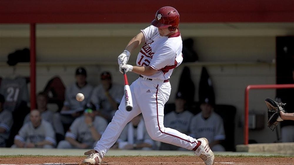 Then sophomore, now junior left fielder Alex Dickerson takes a swing during the Hoosiers' 26-6 win against Michigan on April 4 at Sembower Field.